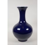 A powder blue glazed porcelain vase, Chinese Qianlong seal mark to base, 13" high
