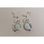 A pair of 925 silver and opalite set drop earrings in the form of cats, 1" drop