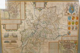 A John Speed map of Gloucestershire with vignettes of battle details of the city and nobles, 20" x