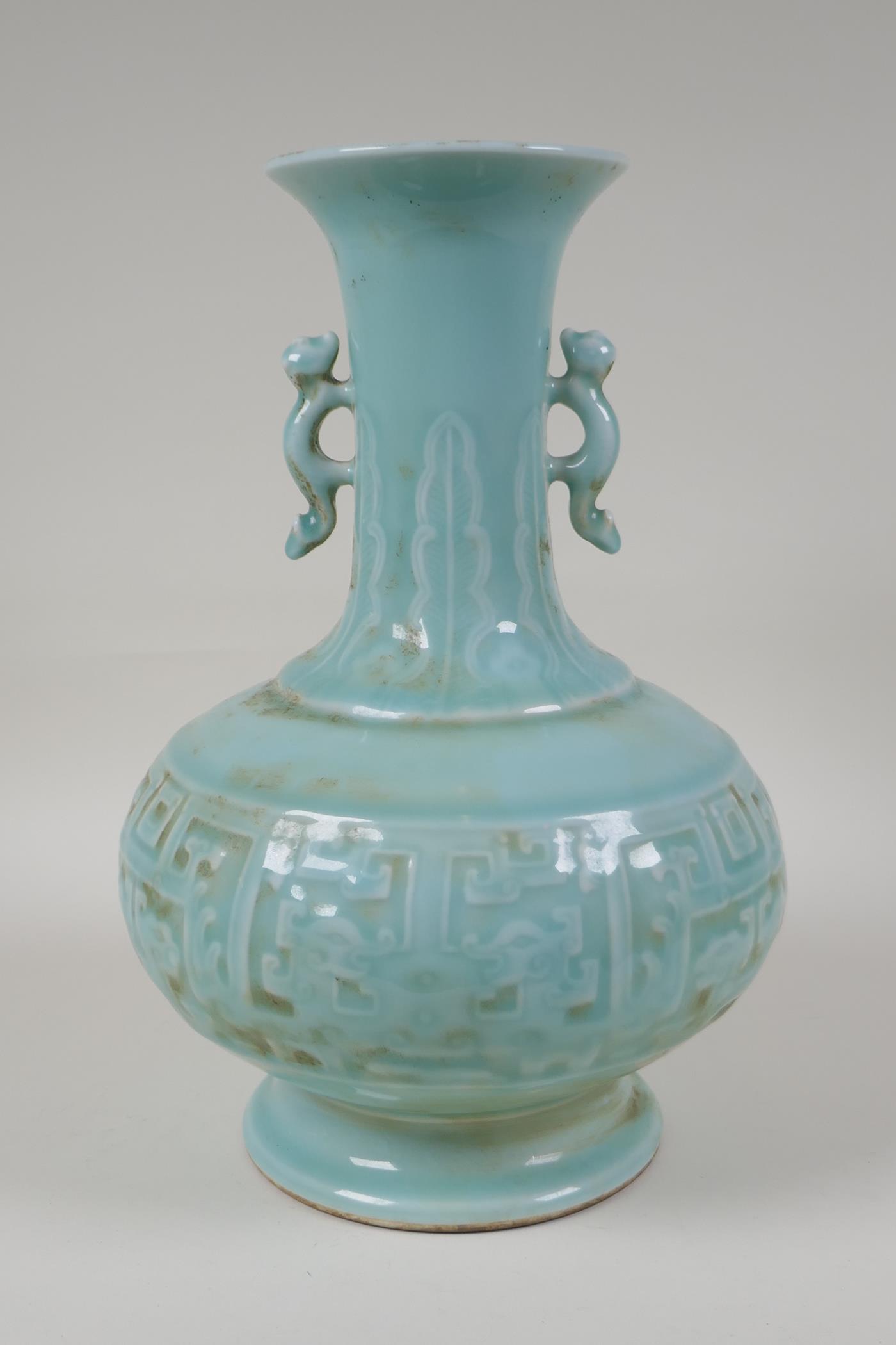 A celadon glazed porcelain vase with two kylin shaped handles and archaic style underglaze dragon - Image 3 of 6