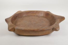 An antique continental carved wood dough trough in the form of a turtle, 19" x 15"