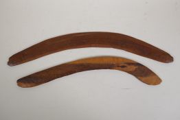 Two Aboriginal carved wood boomerangs, largest 21" long