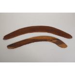 Two Aboriginal carved wood boomerangs, largest 21" long