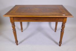 A C19th Italian marquetry inlaid centre table with a single frieze drawer and turned supports,