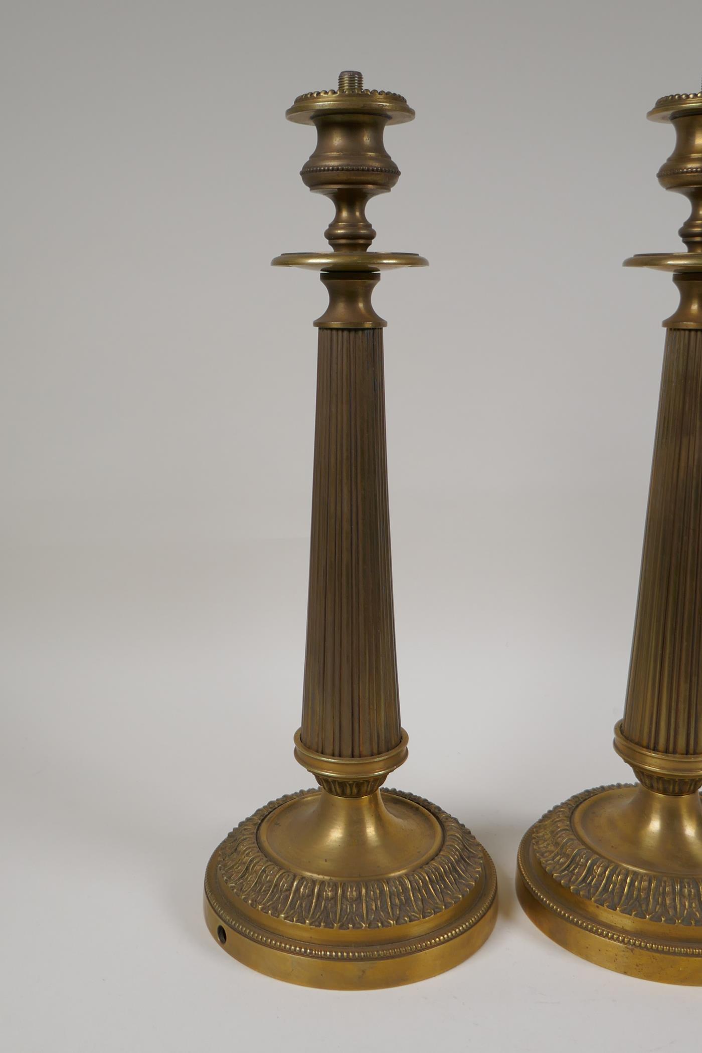 A pair of bronze Empire style candlesticks in the form of fluted columns, part converted for - Image 2 of 5