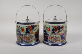 A pair of Imari ironstone biscuit barrels with plated mounts, 6" high x 5" diameter