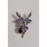 A 925 silver Art Nouveau style fairy brooch set with an amethyst cabouchon