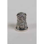 A sterling silver thimble in the form of a dog, 1"