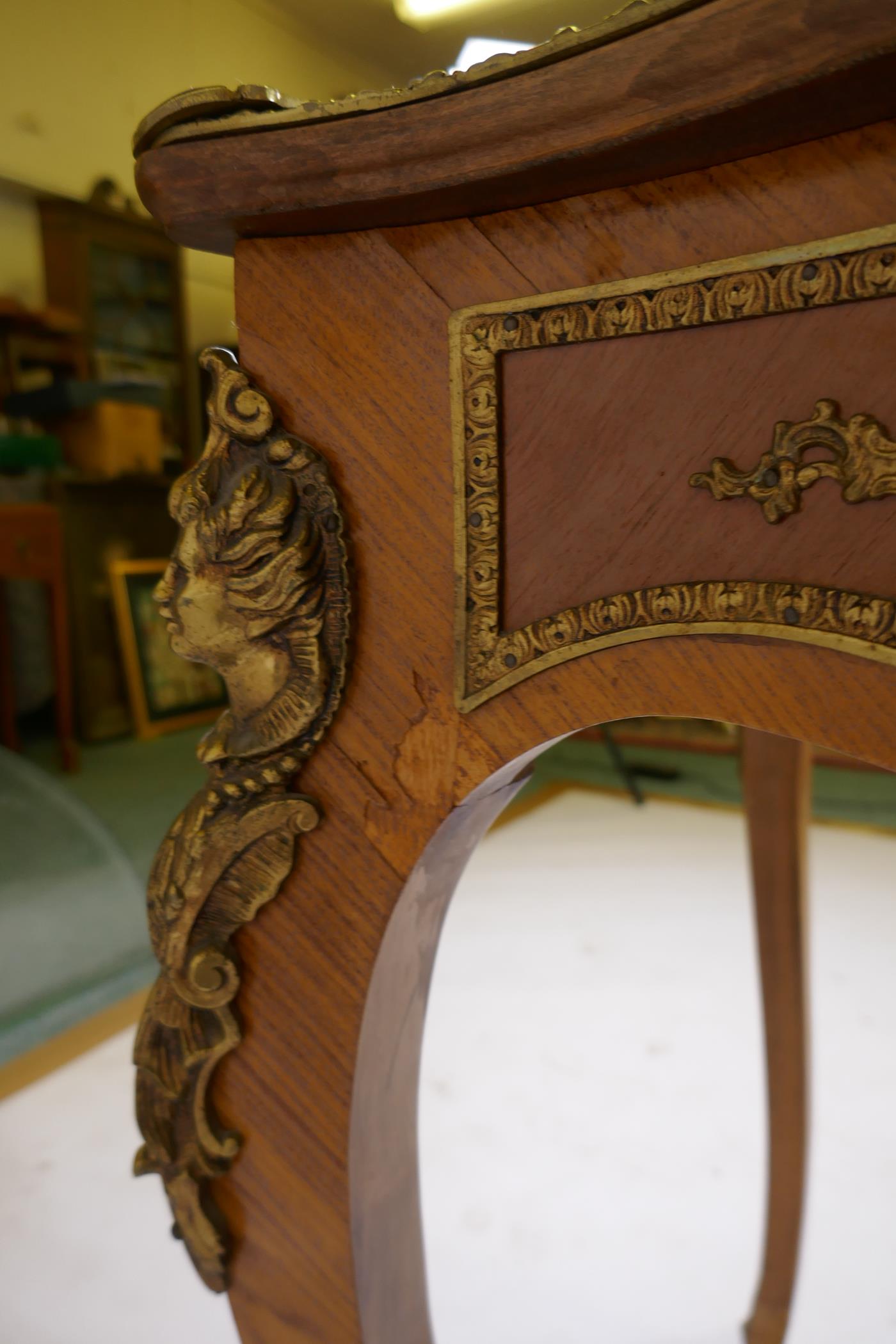 A Louis XV style inlaid tulipwood and brass mounted writing table, with inset leather top and three - Image 8 of 9