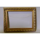 A giltwood and composition picture frame, apperture 26" x 18"