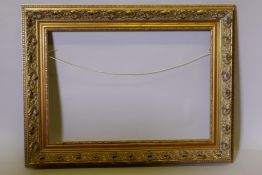 A giltwood and composition picture frame, apperture 26" x 18"