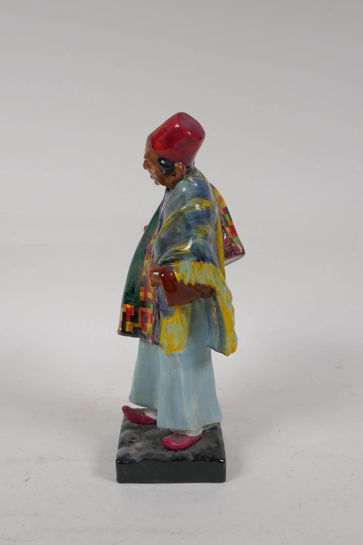 A Royal Doulton figure, Carpet Seller, HN1464, 9" high - Image 2 of 4