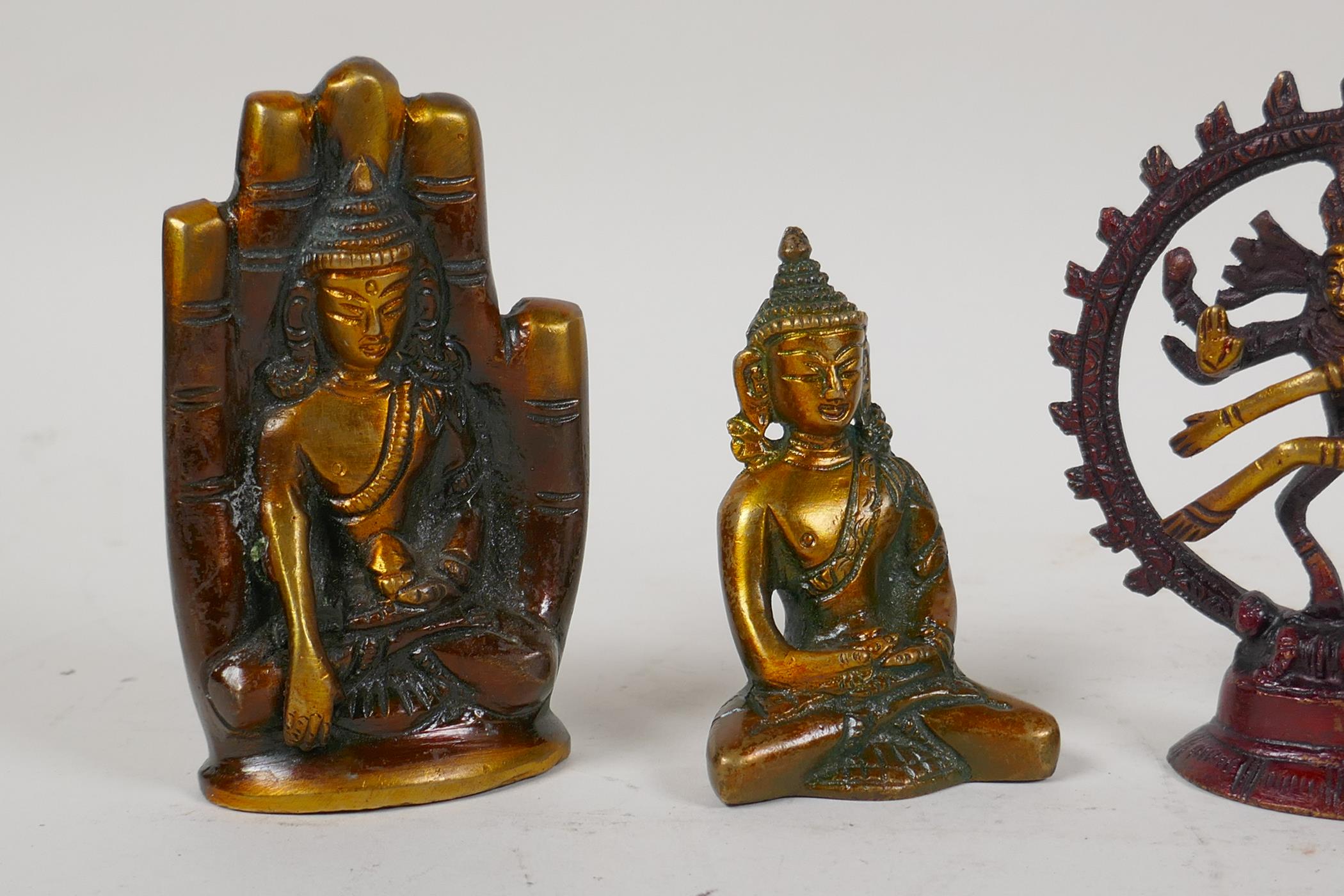 Four Tibetan bronze items including two Buddha figures, a conch shell incense holder and a Shiva - Image 2 of 3