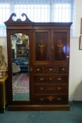 Shapland & Petter of Barnstaple, inlaid mahogany Beaconsfield type wardrobe, with mirrored door,