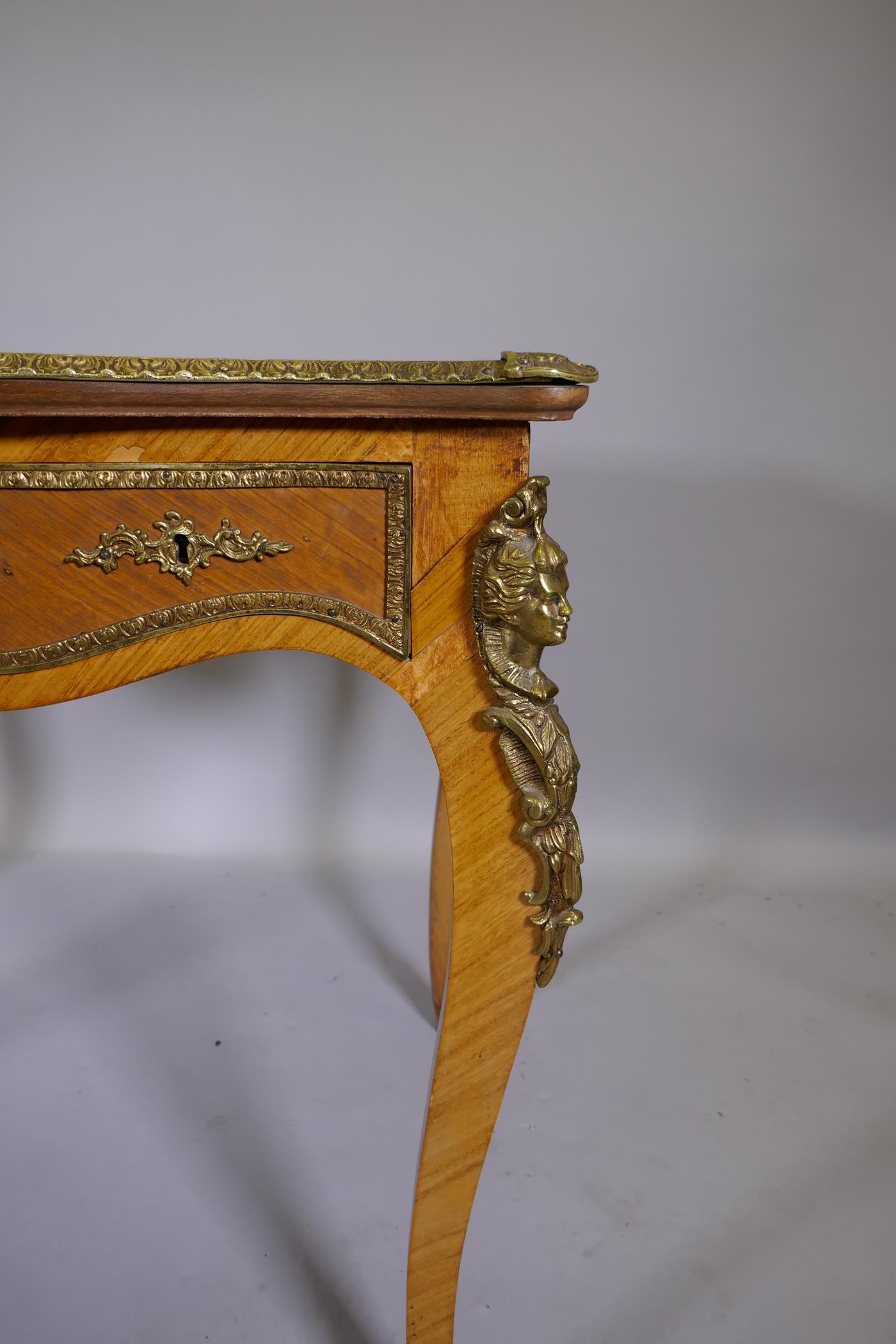 A Louis XV style inlaid tulipwood and brass mounted writing table, with inset leather top and three - Image 3 of 9