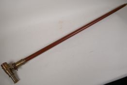 A hardwood walking stick with brass compass and telescope in the handle, 37" long