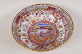 A C19th Chinese Mandarin pattern porcelain bowl painted with figures in a garden, AF, 9" diameter