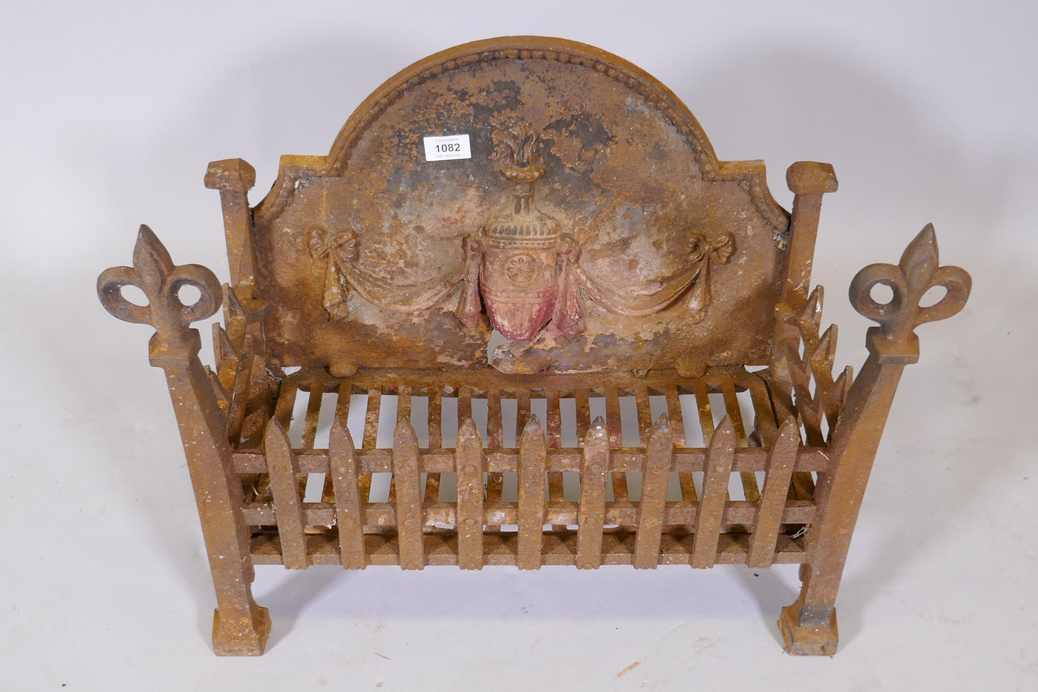 Antique cast iron fire basket with fleur de lys decoration, a poker and tongs, and cross cut saw, - Image 2 of 2