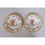 A pair of Chinese export armorial plates with bianco sopra bianco and gilt and enamel decoration, 9"
