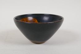 A Chinese Cizhou kiln rice bowl with leaf skeleton decoration, 5" diameter