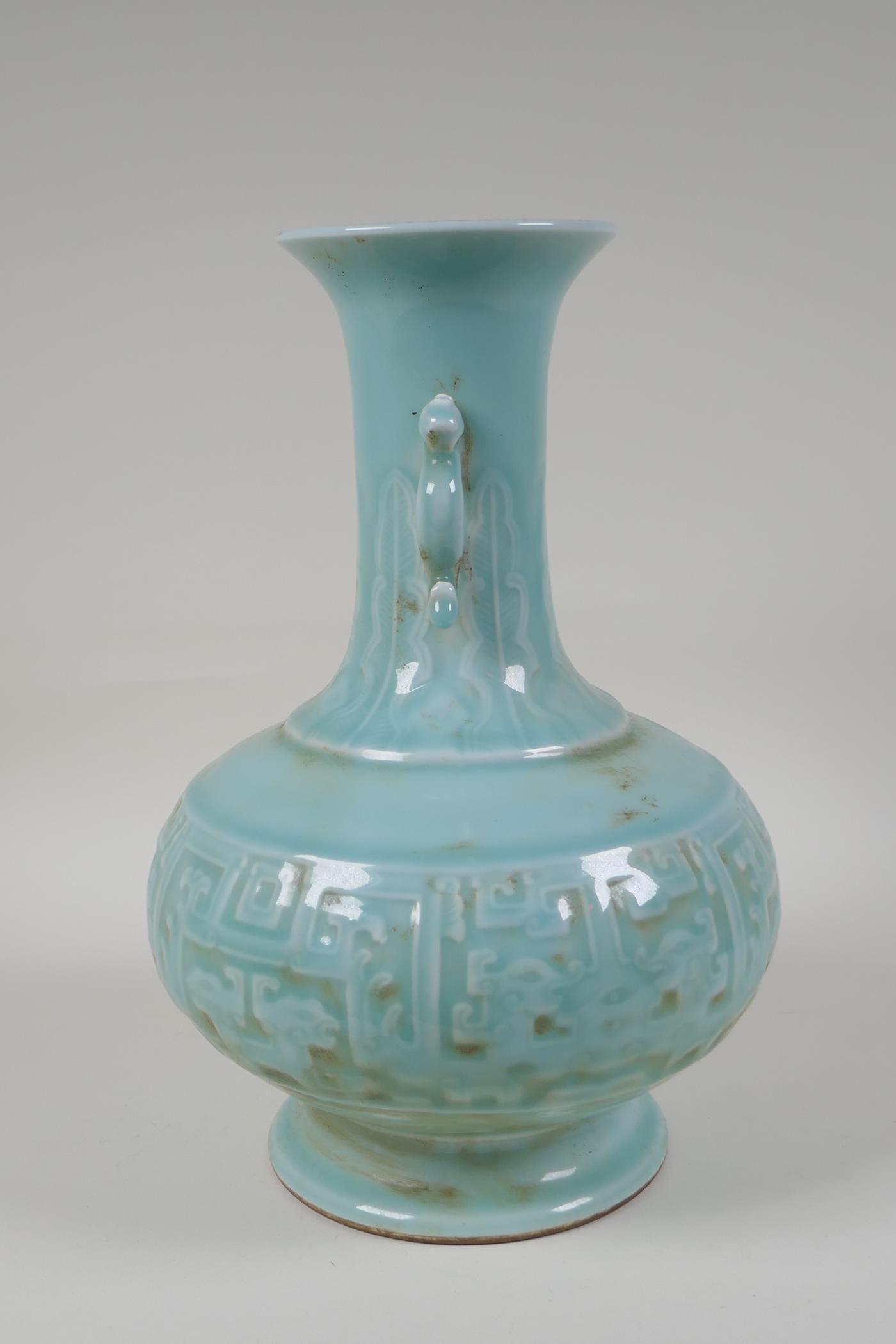 A celadon glazed porcelain vase with two kylin shaped handles and archaic style underglaze dragon - Image 4 of 6
