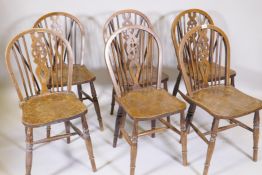 A set of six wheel back chairs with elm seats, mid C20th