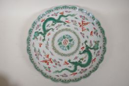 A C19th Chinese famille vert dish with shaped rim and dragon decoration, blue backstrap to base, 12"