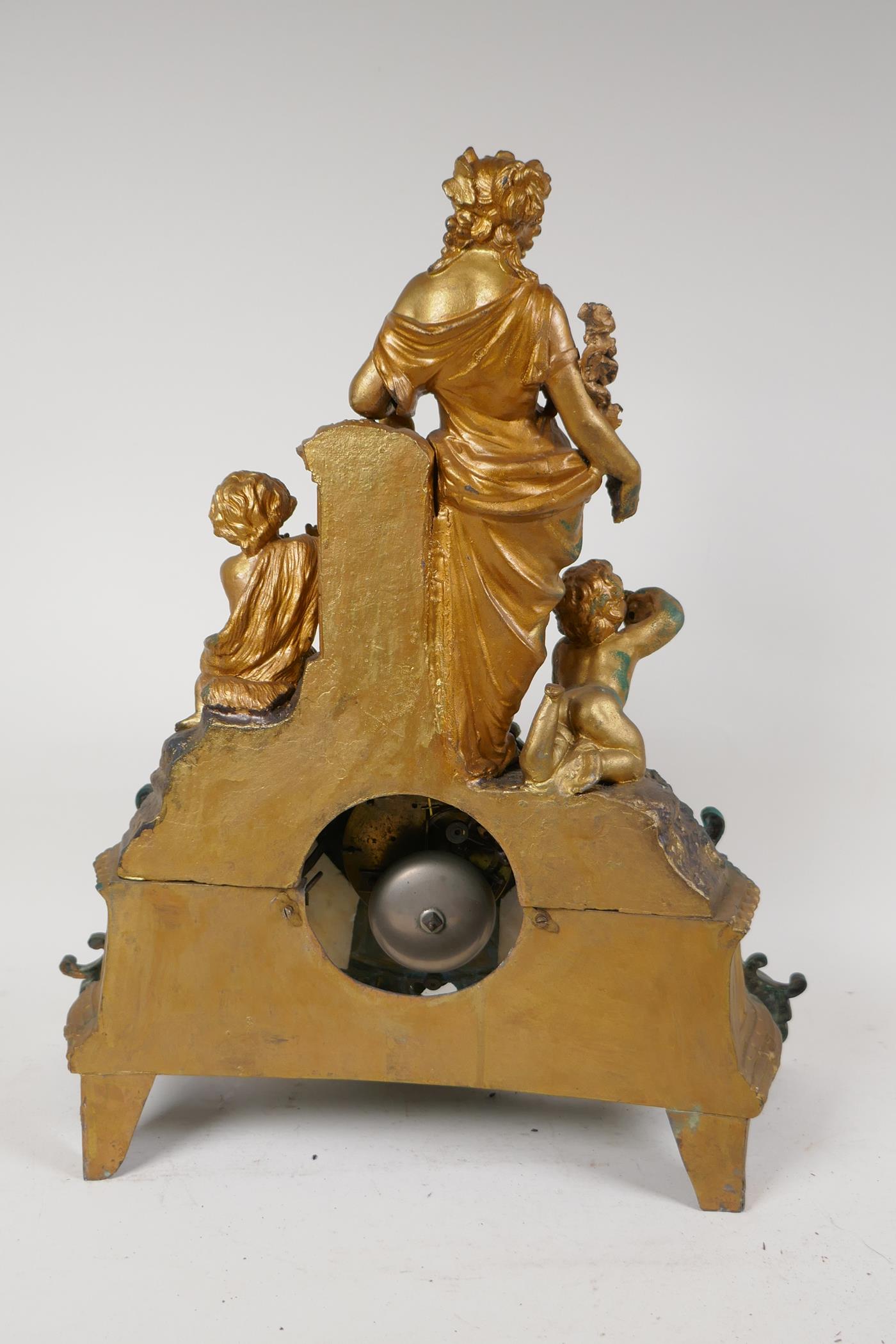 A C19th French spelter mantel clock adorned with Baccanalian figures, with twin train movement - Image 4 of 5