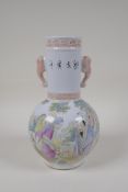A late C19th/early C20th famille verte porcelain vase with two elephant mask handles, decorated with
