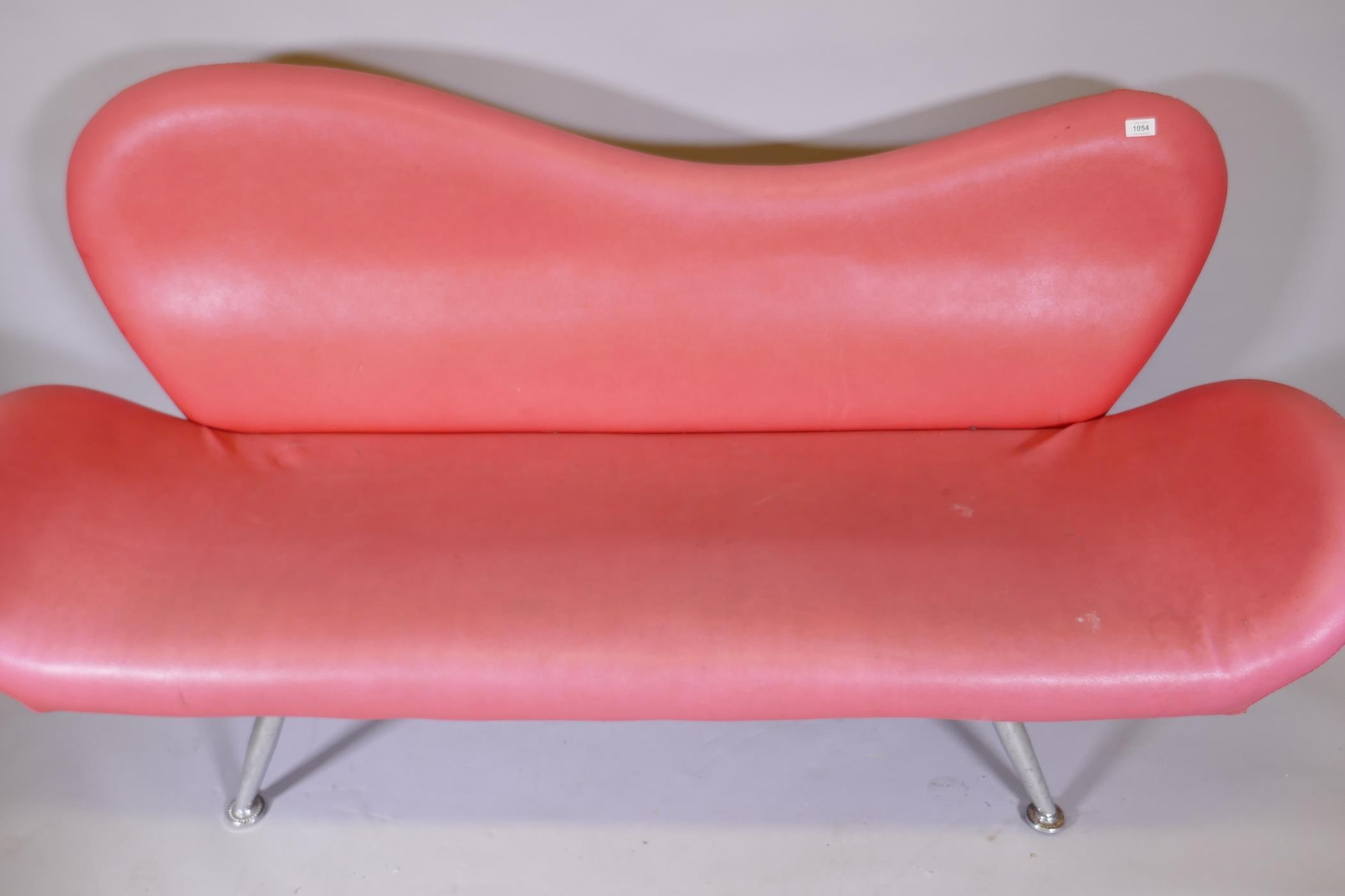 A 1960s style red leatherette shaped back settee on chrome supports, 72" long - Image 2 of 3