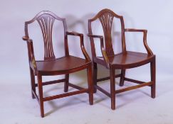 A pair of mahogany Hepplewhite style open armchairs, with shaped back and pierced splat, dished