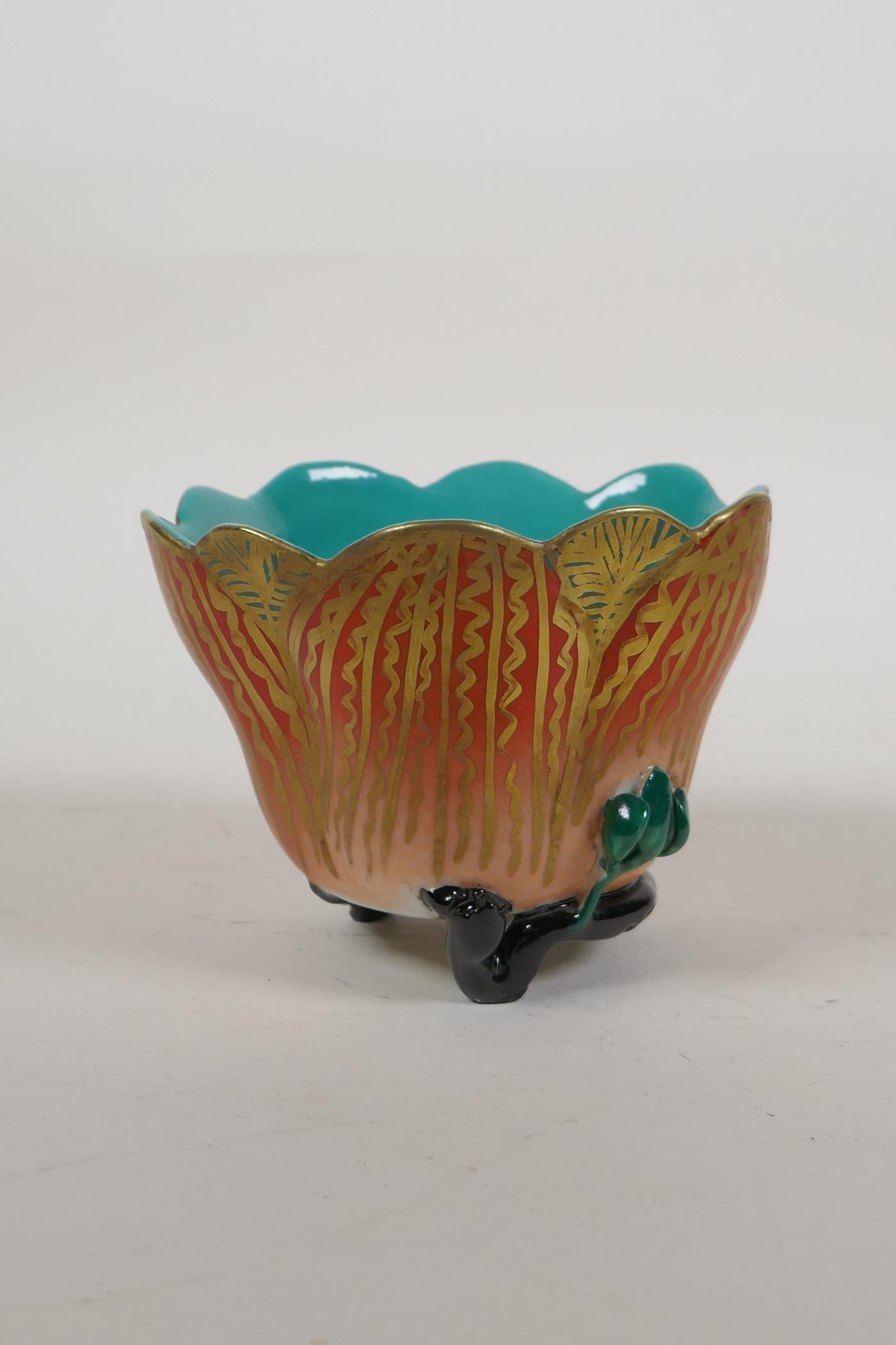 A polychrome porcelain lotus flower shaped rice bowl on a root wood style tripod base, 4 character