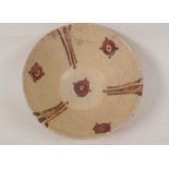 A  Middle Eastern pottery bowl with Persian style drip glaze decoration, 7" diameter, AF