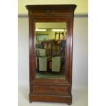 A C19th French mahogany mirrored door armoire, with single drawer below, 43" x 17" x 84"