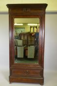 A C19th French mahogany mirrored door armoire, with single drawer below, 43" x 17" x 84"