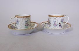 A pair of Chinese export armorial tea cups and saucers, late C18th/early C19th, saucer 5" diameter