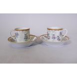 A pair of Chinese export armorial tea cups and saucers, late C18th/early C19th, saucer 5" diameter