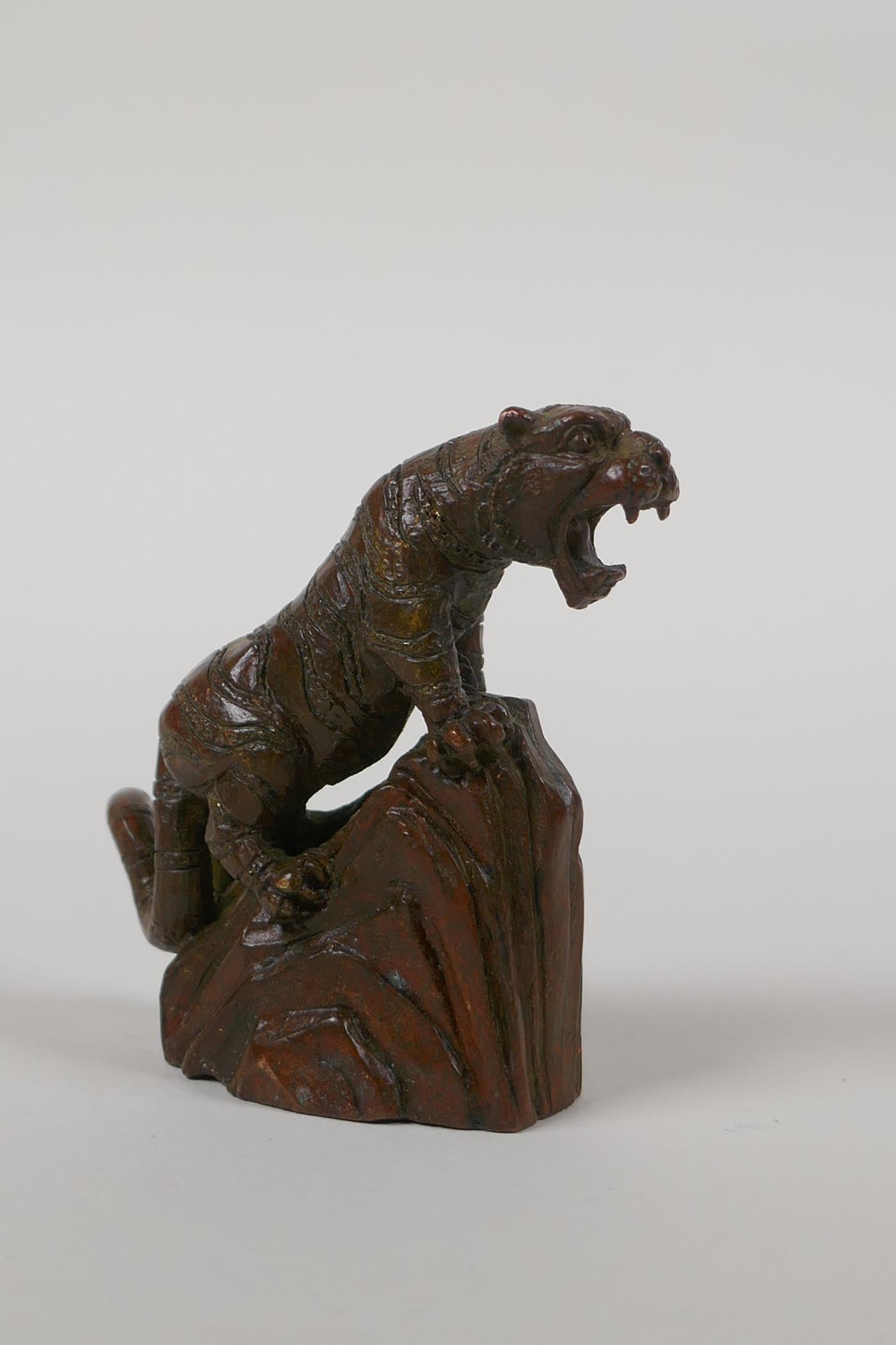 A Japanese bronze okimono of a tiger on a rock, character script to side, 2½" high - Image 3 of 4