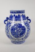 A Qing style blue and white porcelain two handled vase decorated with a dragon, phoenix and lotus