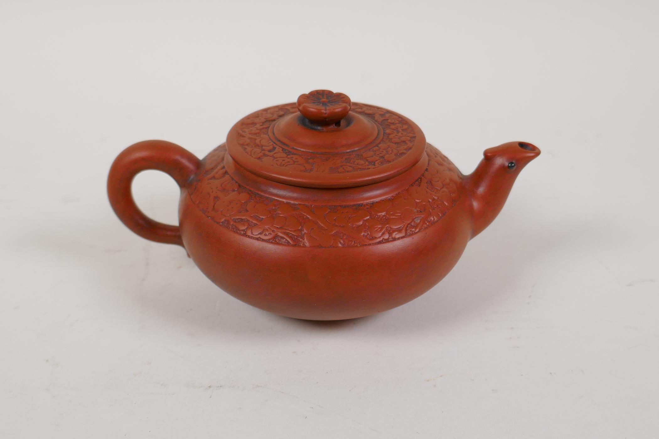 A Chinese YiXing tea pot with moulded prunus blossom decoration, impressed mark to base, 4" diameter - Image 3 of 4