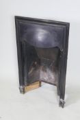 A cast iron fireplace, 18½" wide, 30" high