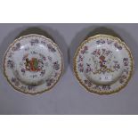 A near pair of Chinese export armorial plates with bianco sopra bianco and gilt and enamel