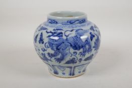A Chinese blue and white porcelain jar with lotus flower and kylin decoration, 6" high