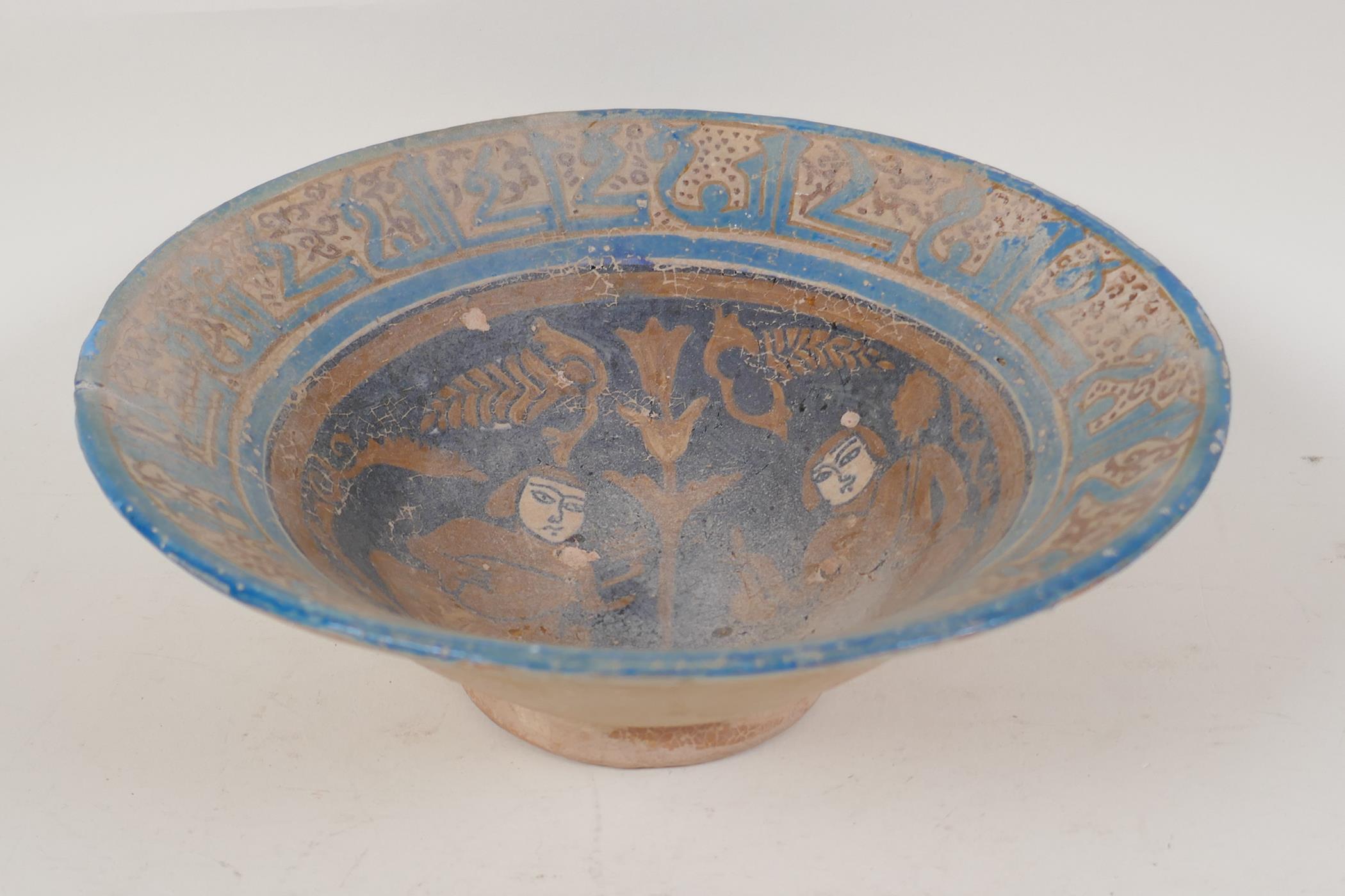 A Persian earthenware bowl decorated with figures in a garden, 9½" diameter - Image 4 of 5