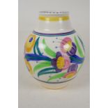 A Poole Pottery vase with traditional floral decoration, 8" high