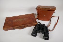 A C19th leather Regalia case with brass name plaque and a pair of vintage binoculars in a leather