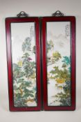 A pair of Chinese Republic style porcelain panels depicting mountain and river landscapes, in