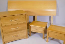 An 'Aspace' three drawer oak chest, 30" x 20" x 32", two oak bedside tables and a bedhead
