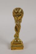 An Art Nouveau style gilt metal desk seal, the handle in the form of a female bust, 4" high