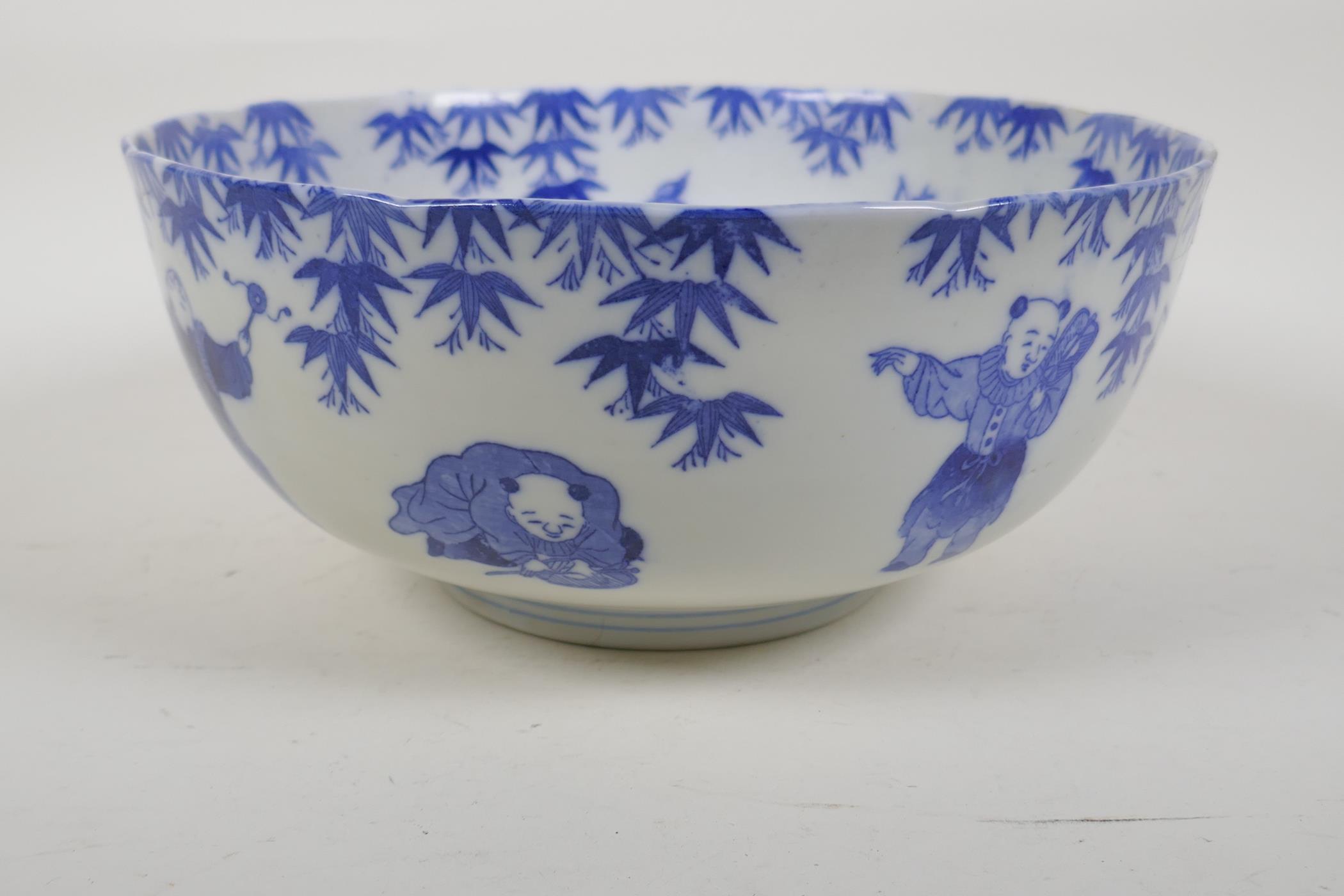 A Chinese Republic blue and white porcelain punch bowl decorated with boys at various pursuits, - Image 3 of 8